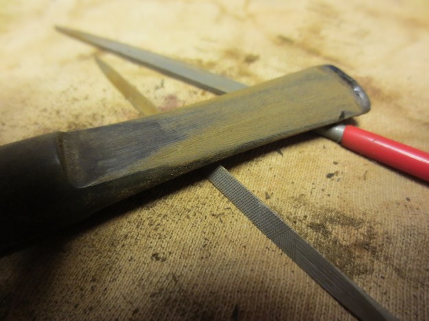 Figure 6 The top side - note the left side dent on the edge of the stem. This would require more sanding, shaping and filling with black superglue.