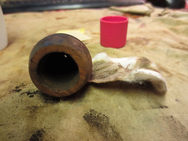 Wiping down the newly topped rim with acetone