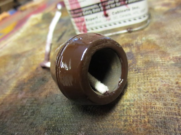 Stained with oxblood stain.