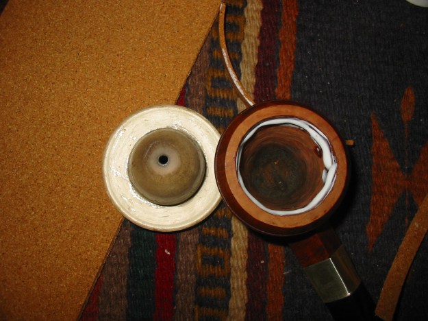 The cork gasket glued into the bowl with carpenters white glue