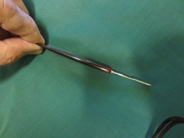 Side view of the scraper with top up